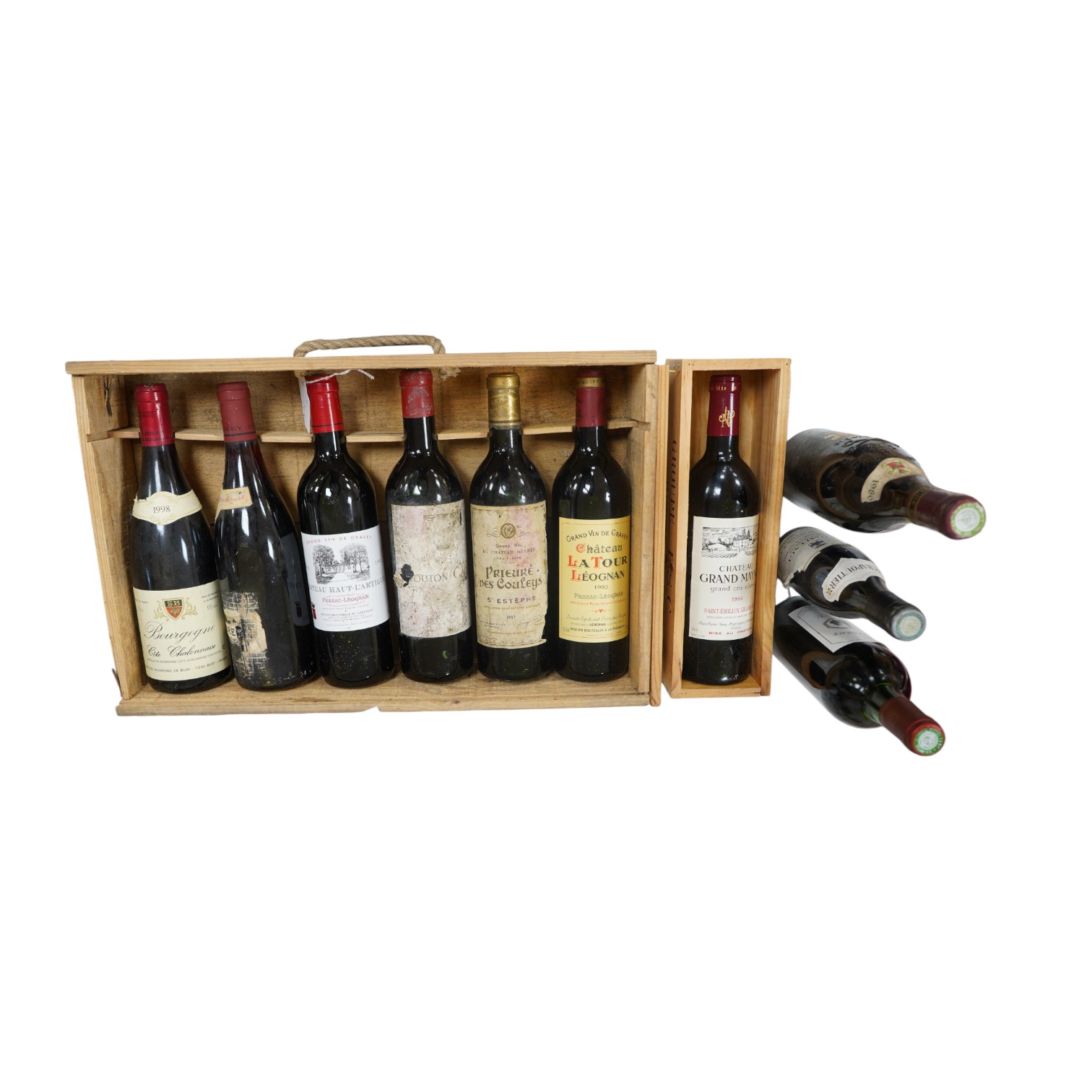 Nine bottles and a half-bottle of wine including Chateau Grand Mayne 1986 St Emellion, a bottle of Prieure De Chateau Meyney St. Estephe 1957 and a half bottle of Chapoutier, Hermitage. Condition - unknown storage